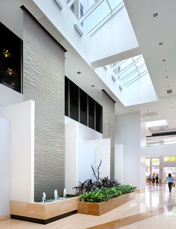 HarmonicEnv's tweet photo. #tbt to these twin 25-foot tall Harmonic Cascade® waterfalls at Banco Popular in Hato Rey, Puerto Rico. Designed and created with SCF Arquitectos, these features, along with the large Cascade® featured 2 weeks ago, enhance the contemporary design of the building. https://t.co/QdSQVjKdlD
