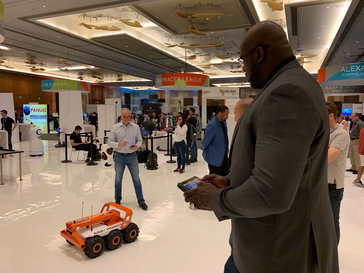 AionRobotics's tweet image. Thanks @SHAQ for stopping by the AION ROBOTICS @AmazonreMARS booth for a  test drive of our M6 commercial UGV! #ballin #reMARS #robotics #robots #AI @awscloud #AWSRoboMaker