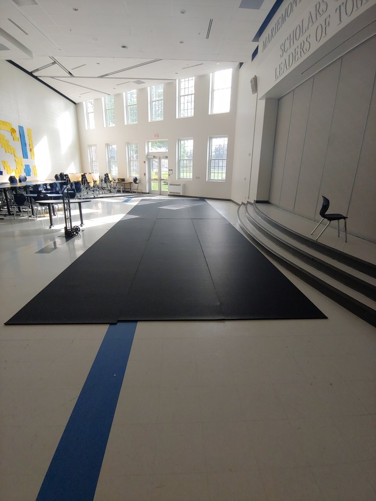 mmontad's tweet photo. Flooring down at MJHS for temporary weight room.  Thanks to Butch for his help. The weight room is temporary, the work you put in it is permanent.  #bebetter https://t.co/jmqR0rgu8U