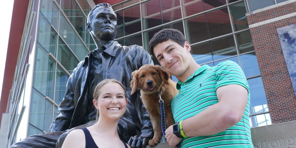 PurdueEngineers's tweet photo. 🌞 Beautiful day on campus for @PurdueAeroAstro PhD student Kate Fowee to introduce her new pup to Neil, after returning from a @NASAGoddard internship working on small satellite projects. https://t.co/XZLGx37kMb