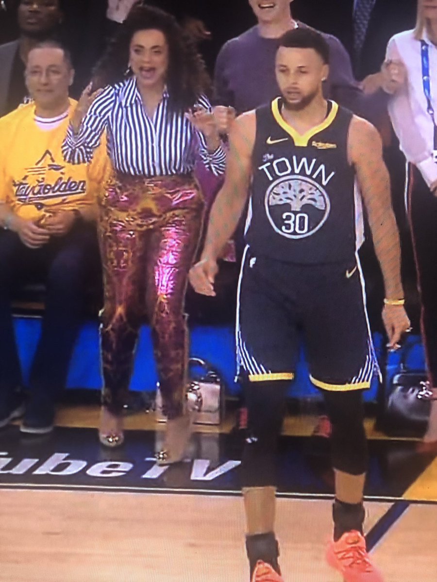 lbfight's tweet photo. Holy Lord, WHAT is that???? This lady has broken all sorts of fashion laws. Yikes! #NBAFinals #TORvsGS https://t.co/Fqh5KpiZOm