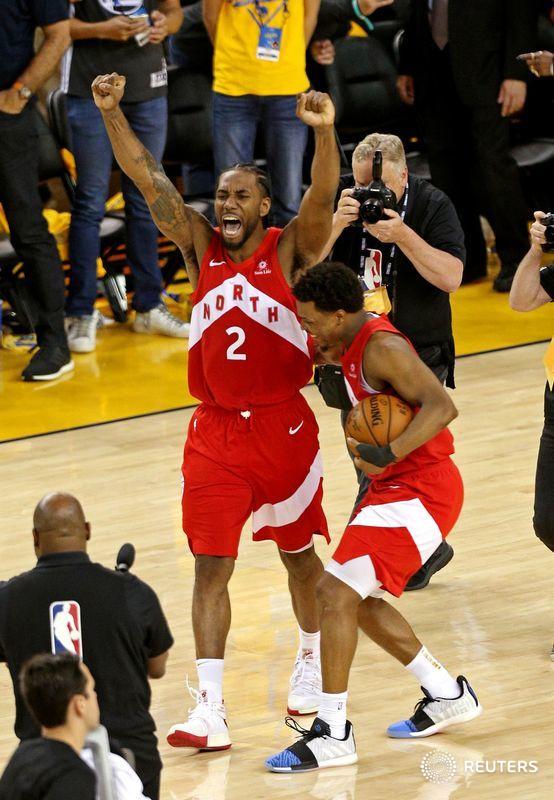 Reuters's tweet photo. Toronto Raptors beat Golden State Warriors to become the first Canadian team to win an NBA title https://t.co/M8NGVK7Fma https://t.co/sKhzgiqmUh