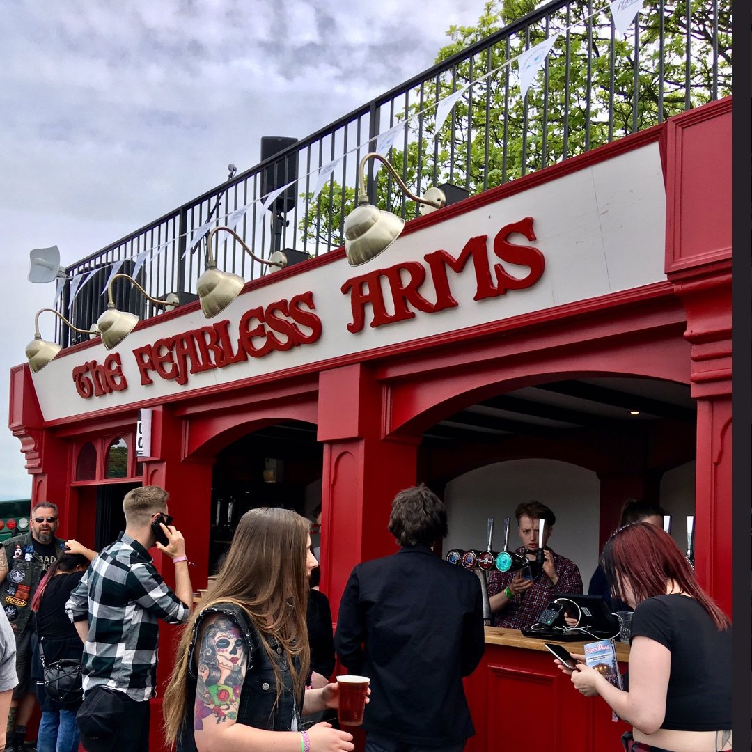 TrashbagGhost's tweet photo. From pencil and paper to olde English pub was a fun project to be a part of. Fearless Records creative pop-up pub installation in England. Hope all who got a chance to visit "The Fearless Arms" had a great time! 🇬🇧🐉

Sign 📷: @fraserkerrphoto 
Pub Front 📷: @stymiesi https://t.co/xxzEWUzs7L