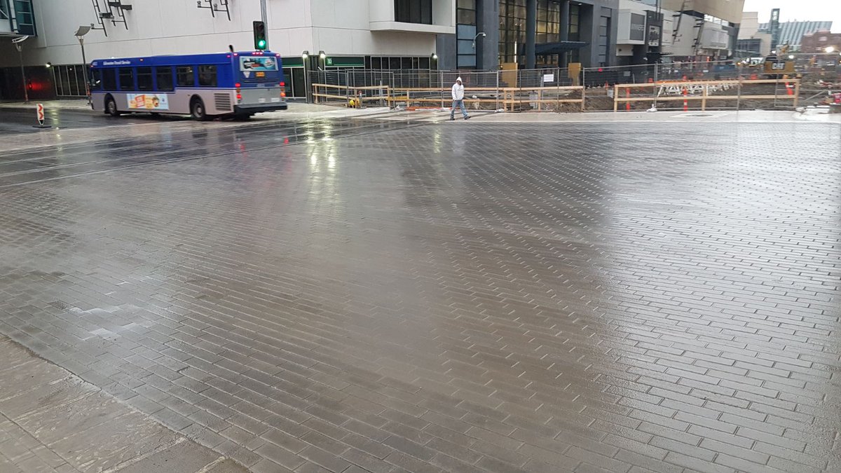 oldworldpaving's tweet photo. Shiny new pavers at 102 ave and 101 st. Look at those lines! #yeg https://t.co/vmbeIaOGsN