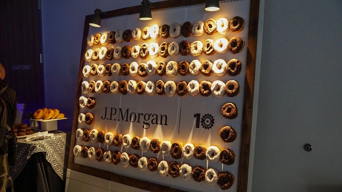 The party doesn't stop on the 1st floor— stop by the 8th floor for some futuristic DJ entertainment from <a href="/Holocrypticsinc/">Holocryptics</a> &amp; a tasty donut wall from <a href="/jpmorgan/">J.P. Morgan</a>!