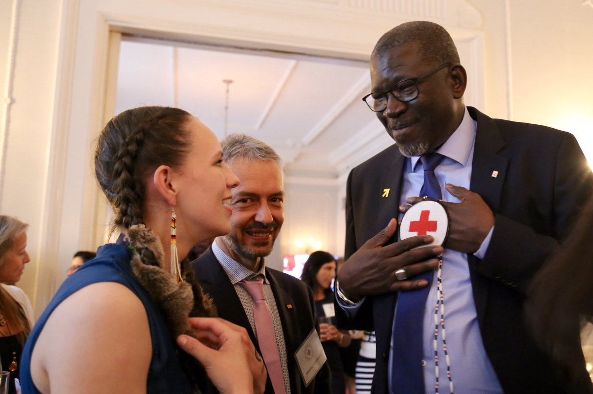 redcrosscanada's tweet photo. We ❤️ this @WomenDeliver moment! @As_SyIFRC Sec. Gen of @IFRC, overjoyed with a handmade medallion from our Indigenous Youth Leader, Shaylynn McAuley. #RedCrossWD https://t.co/3Fprl0xjcx