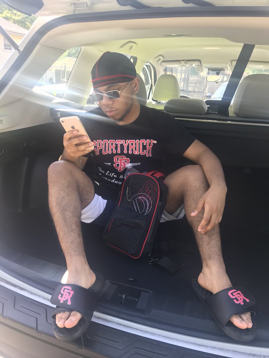 Where my #dawgs at!?? Chillin’ inside these comfy @sportyrichapparel slides!! My #feet are in ❤️.  @therealdantehoagland had to slide out in sportyrichapparel slides, shirt &amp; bag #lifestyle #everday #people #salute <a href="/617mikebiv/">Mike Biv</a>