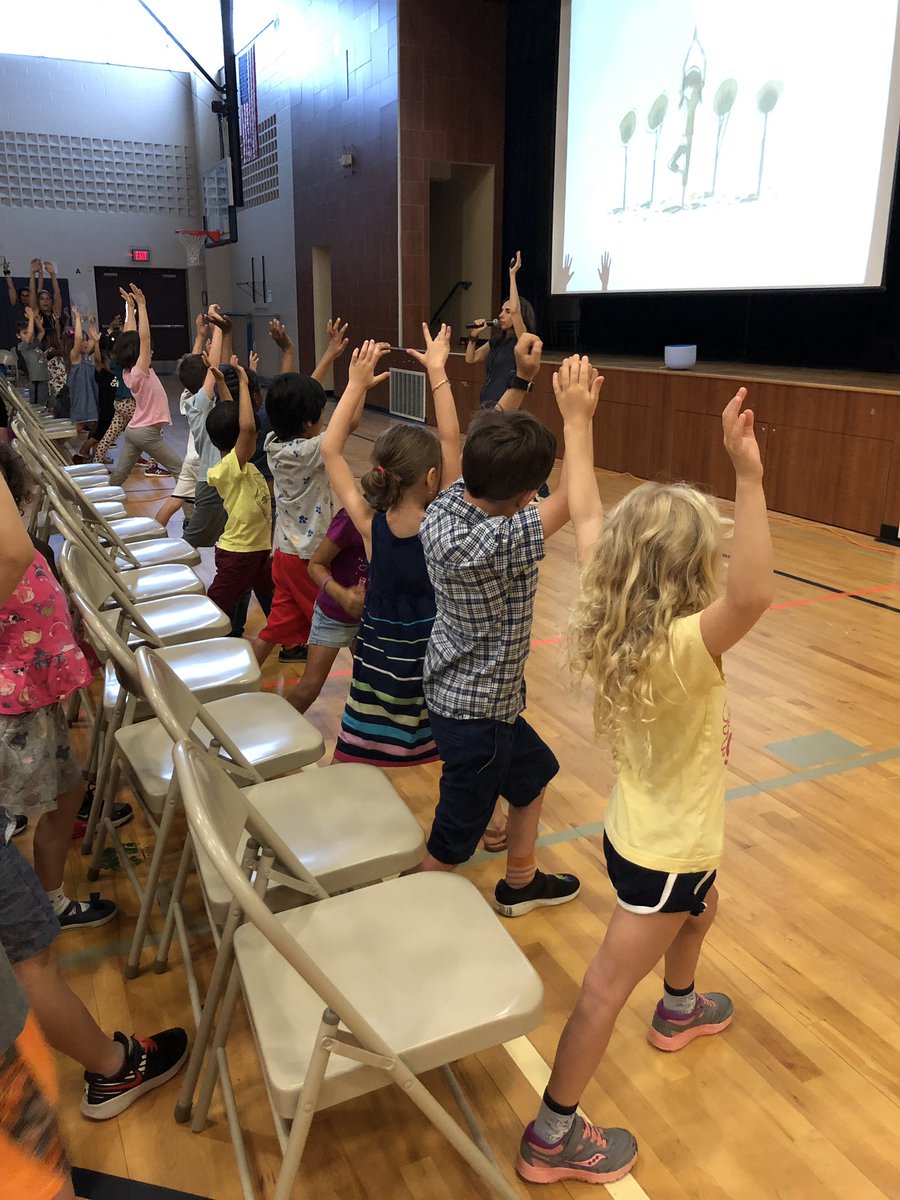 CHBullockSchool's tweet photo. @susanverde spoke to our students today about being a writer. She started us with some breathing exercises and yoga poses. Look at our little “warriors!” Thank you for reading “I Am Human” to us. #CHBProud #CHBPTA https://t.co/FKYyw8q2zL