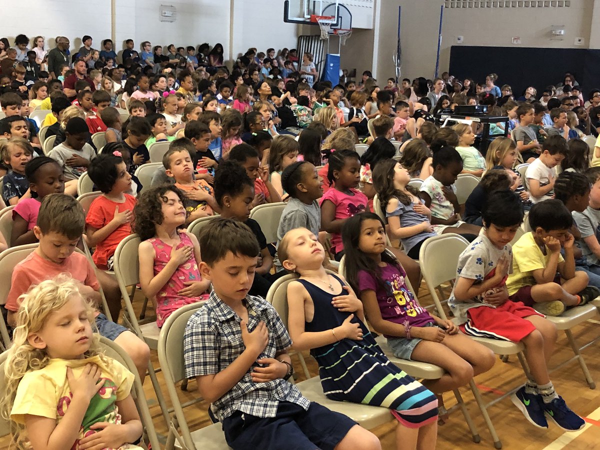 CHBullockSchool's tweet photo. @susanverde spoke to our students today about being a writer. She started us with some breathing exercises and yoga poses. Look at our little “warriors!” Thank you for reading “I Am Human” to us. #CHBProud #CHBPTA https://t.co/FKYyw8q2zL