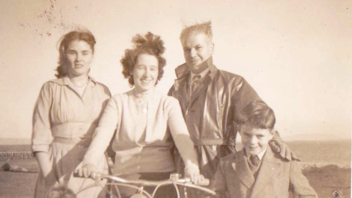 florNEWS's tweet photo. Maureen Sweeney (centre) on her bicycle at #Blacksod #Mayo with friends Delia Melody & Tommy Sweeney and her son Ted Jnr #StormFront #StormFrontInMayo #DDay75thAnniversary https://t.co/zg0OctufRJ