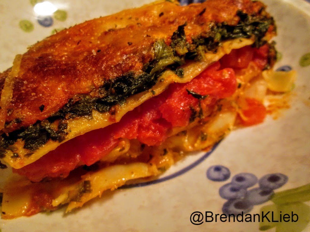 BrendanKLieb's tweet photo. It's vegetable lasagna for dinner this evening. 
This one is filled with roasted tomatoes, spinach, garlic, mozzarella, parmesan and a little bleu cheese, and homemade lasagna noodles. 
Happy Thursday evening. 😊
#cooking #pasta #cheese #dinner #vegetarian https://t.co/YfOZU9JE0I
