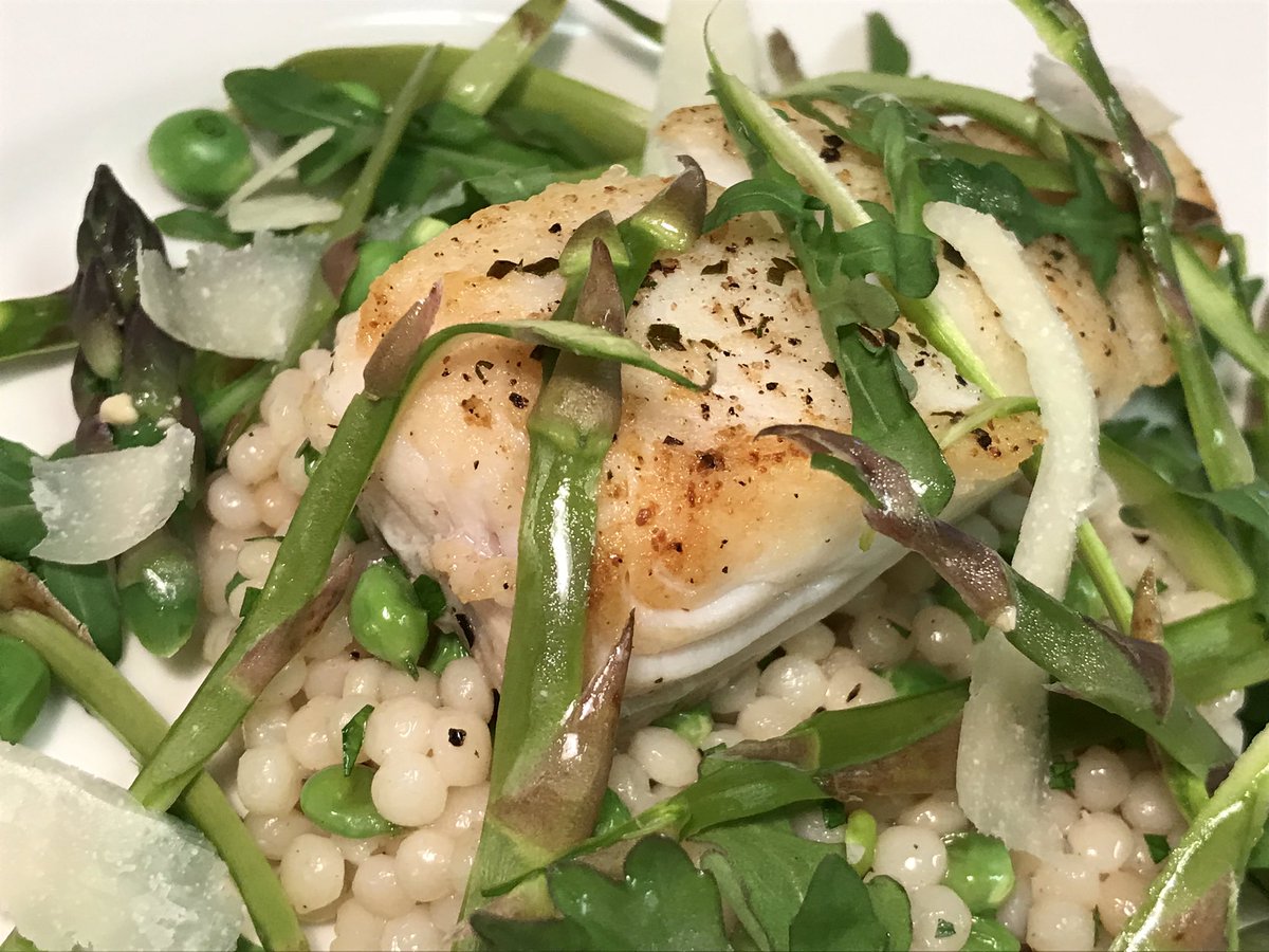 Pan Seared Pacific Halibut / Israeli Couscous &amp; Spring Peas / Shaved Asparagus &amp; Baby Arugula in a light Lemon Vinaigrette / Shaved Pecorino / Arugula Pesto 💚💚💚

#dinnerathome #halibut #seafood #cheflife