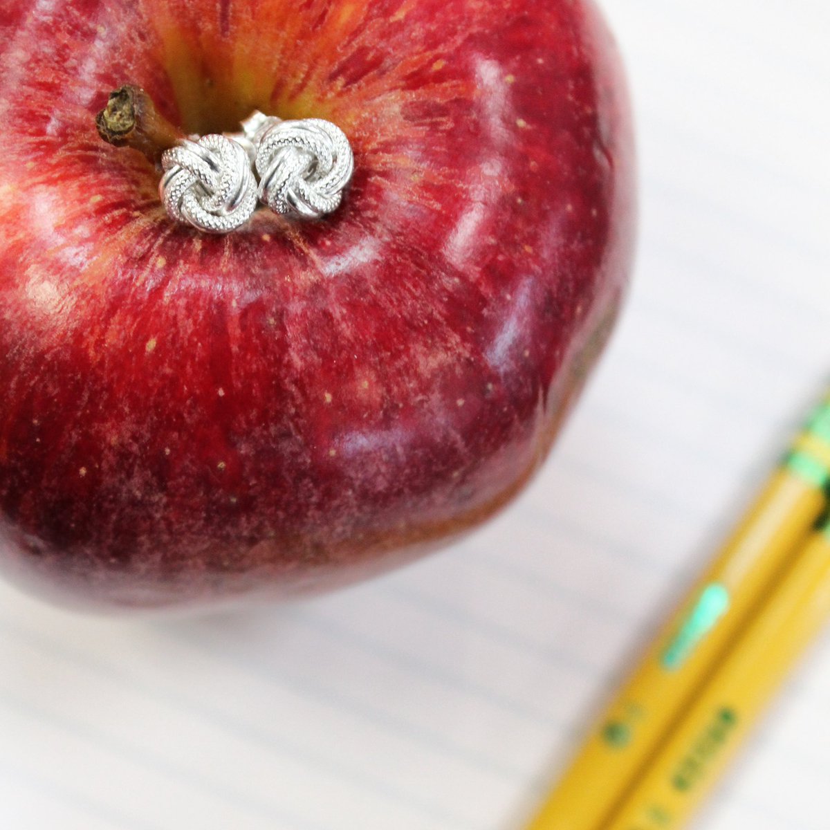 Looking for an A+ gift for an awesome teacher? 👩‍🏫 Our sterling silver Love Knot earrings starting at $35 are perfect. ✨ #endofyeargifts #schoolsout #teachergift #teacherappreciation #school #teachers