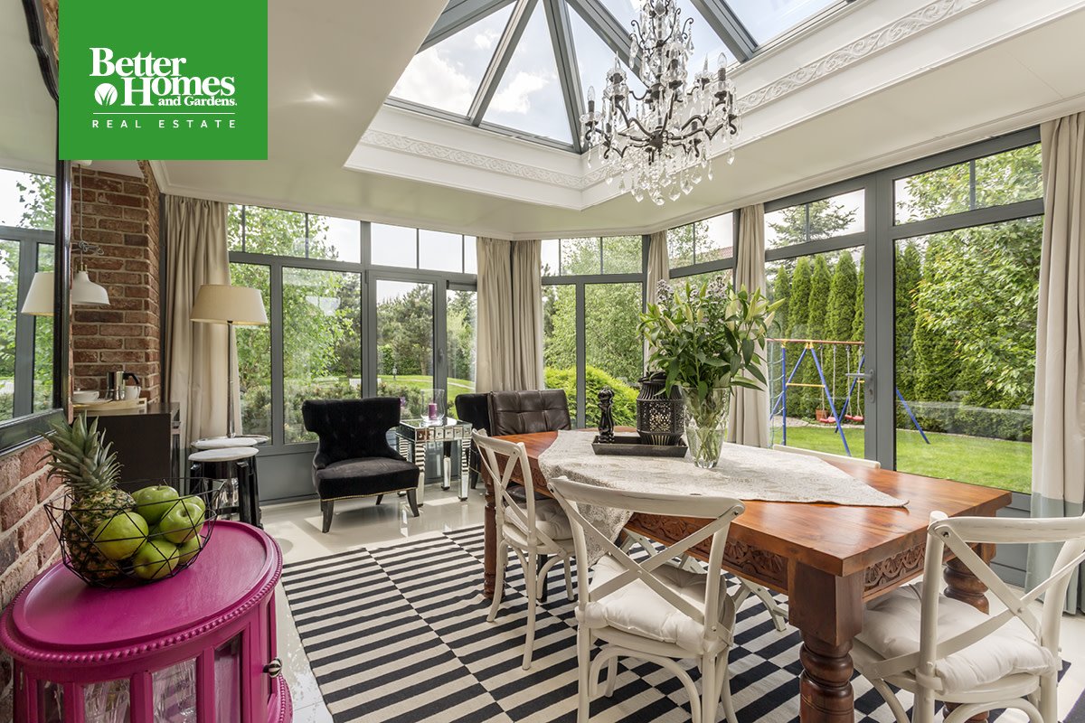 My favorite element in this sunroom is the _____.
A skylight
B modern chandelier
C pink table
Did we miss something? Let us know below. #Sunroom #ExpectBetter #BHGRE