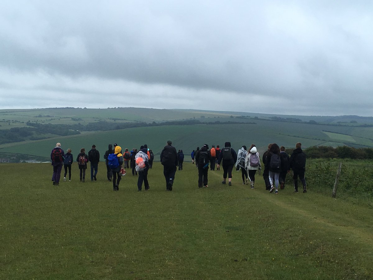 HpsHove's tweet photo. #ValleyChallenge Seriously brisk pace! Nearly at Pyecombe for lunch stop. Weather is clearing and we think Mr Roberts walked with us for the toughest and wettest part of the day so far! ๐๐ https://t.co/T2dDL4Exzd