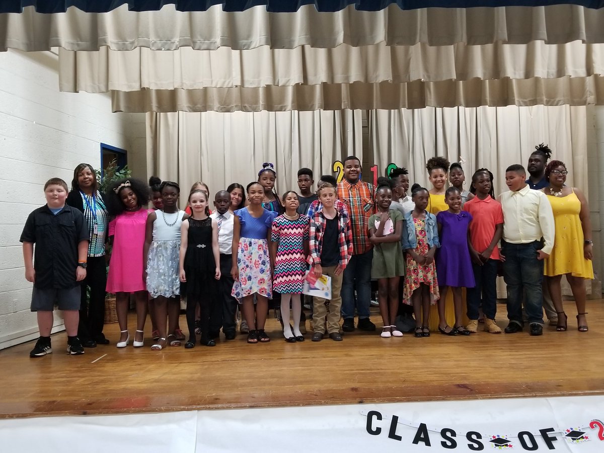 Students, staff and speaker, Khalil Gay