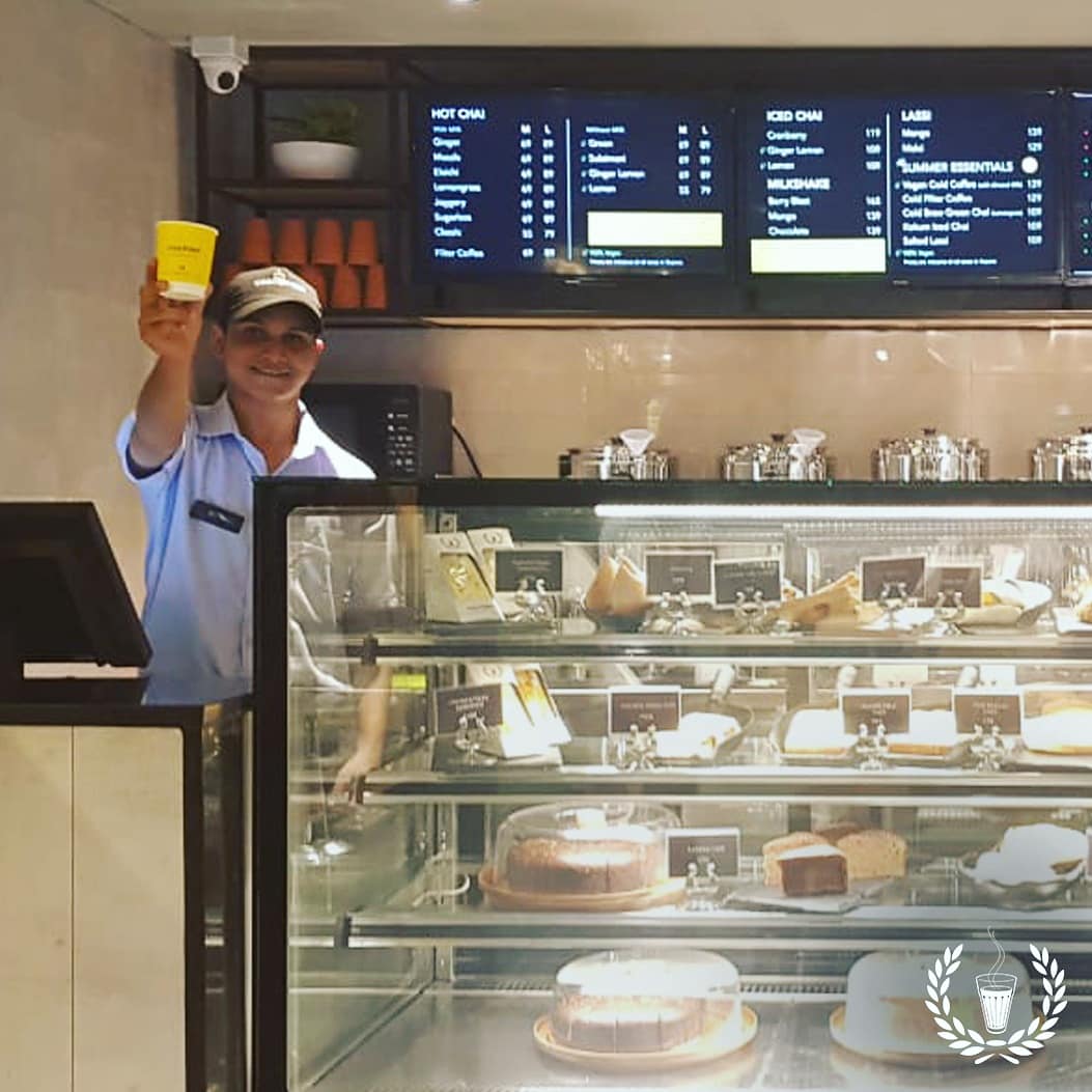 Chai_Point's tweet photo. A hop to shop, a skip to sip and a jump for the movies, this store of ours is down the road from Christ University.
Guess the location of this Chai Point store and tag your #hangout buddies.
#Bangalore #guessthestore #FridayMotivation #FridayFeelings #FridayThoughts #challenge https://t.co/c1TIyZSy2H