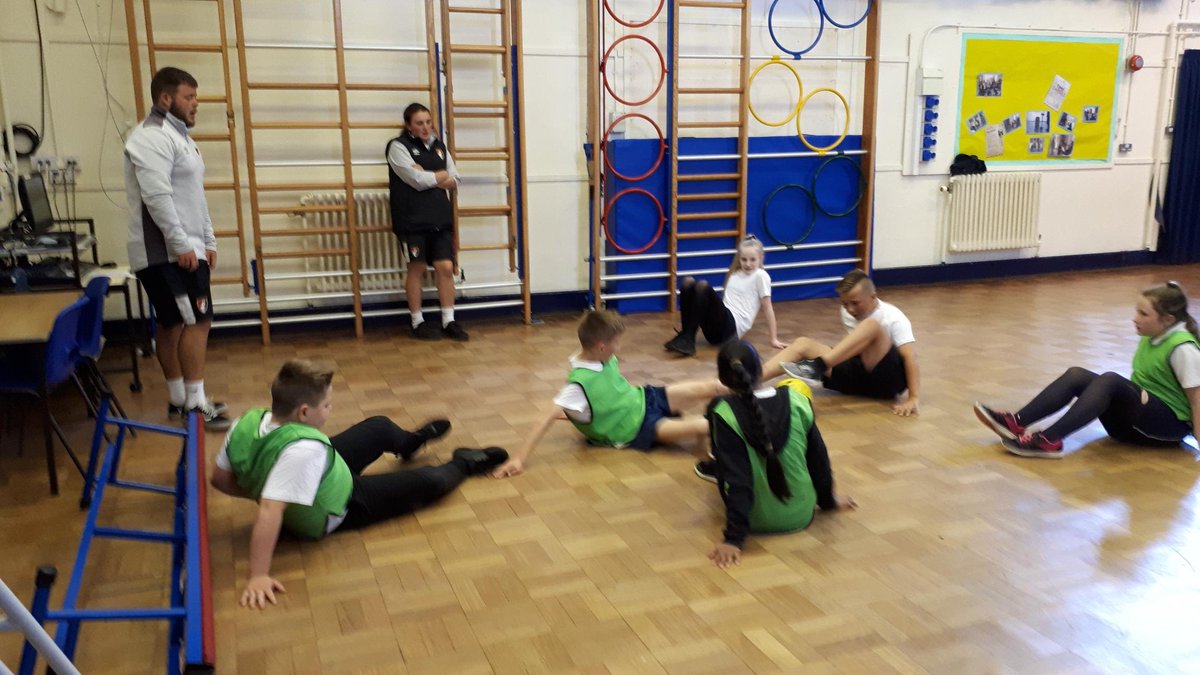 Kinson_Academy's tweet photo. AFCB Community Trust have been in school for 6 weeks working on Football in Year 6 PE Lessons. The wet weather meant instead of a mini tournament they had to move inside and compete playing Crab Football. @Ambitions_AT @AFCBCommunity #footballcrazy #footballfun #kinsonkidz https://t.co/Ik99yWERNy