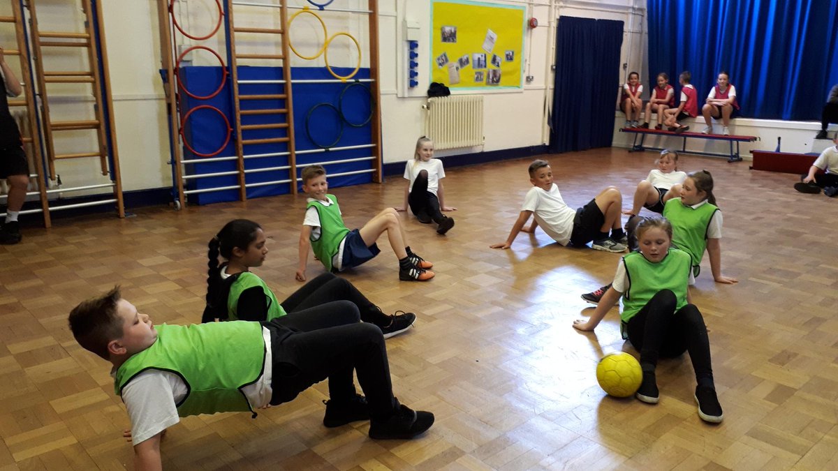 Kinson_Academy's tweet photo. AFCB Community Trust have been in school for 6 weeks working on Football in Year 6 PE Lessons. The wet weather meant instead of a mini tournament they had to move inside and compete playing Crab Football. @Ambitions_AT @AFCBCommunity #footballcrazy #footballfun #kinsonkidz https://t.co/Ik99yWERNy