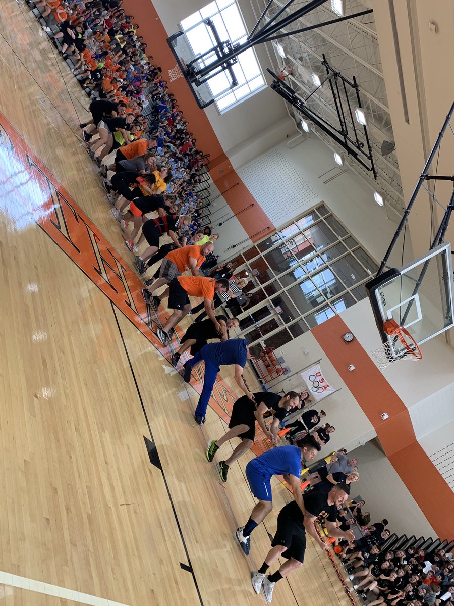 NAMS_SocStudies's tweet photo. Teachers flex their muscles during tug of war @NAMS1617 Phys Ed Olympics https://t.co/fPvjGL45ZC
