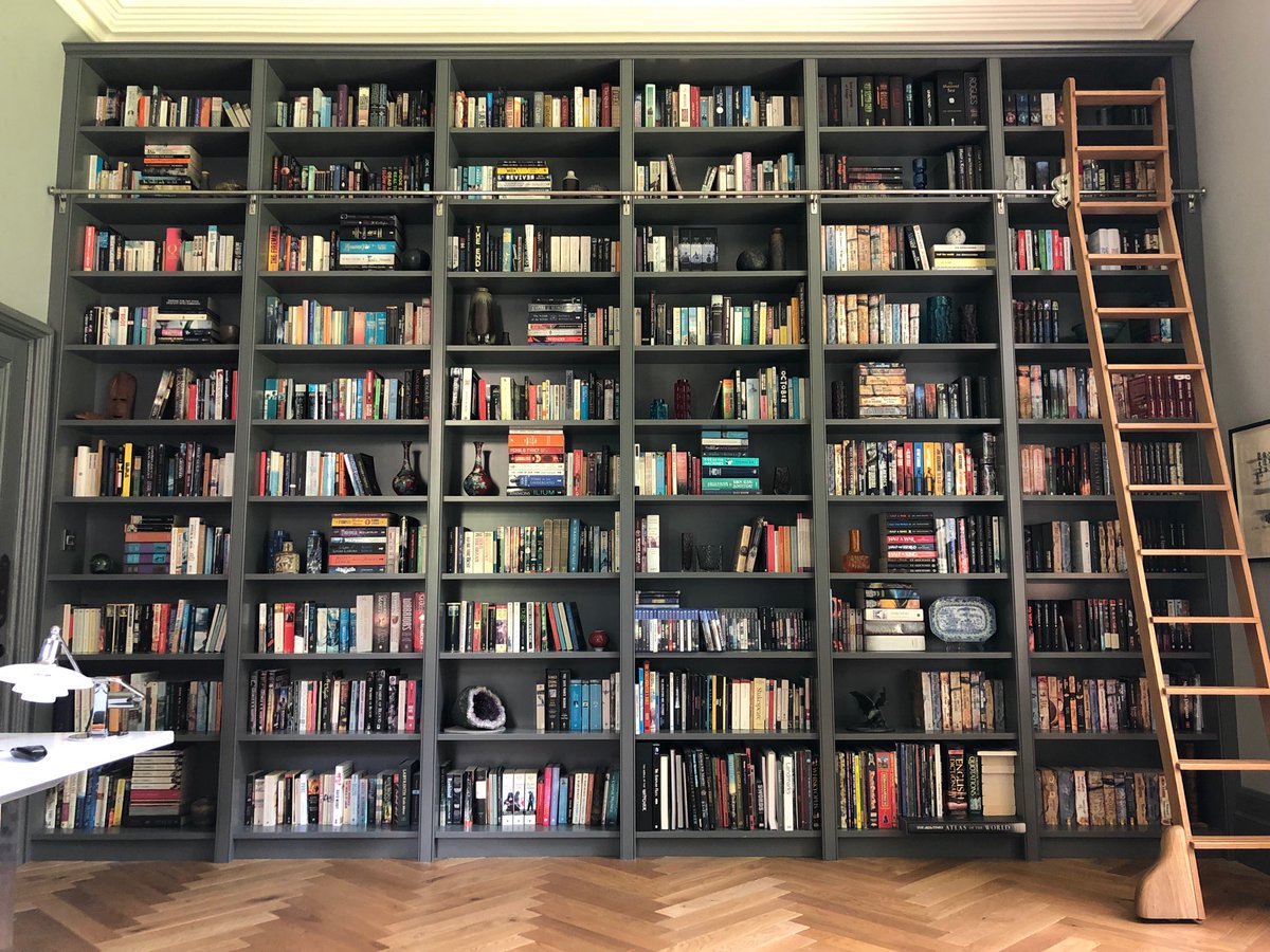 I know some of you enjoy a little bookcase porn from time to time. Courtesy of our brilliant joiner Colin my books are finally out of their boxes...