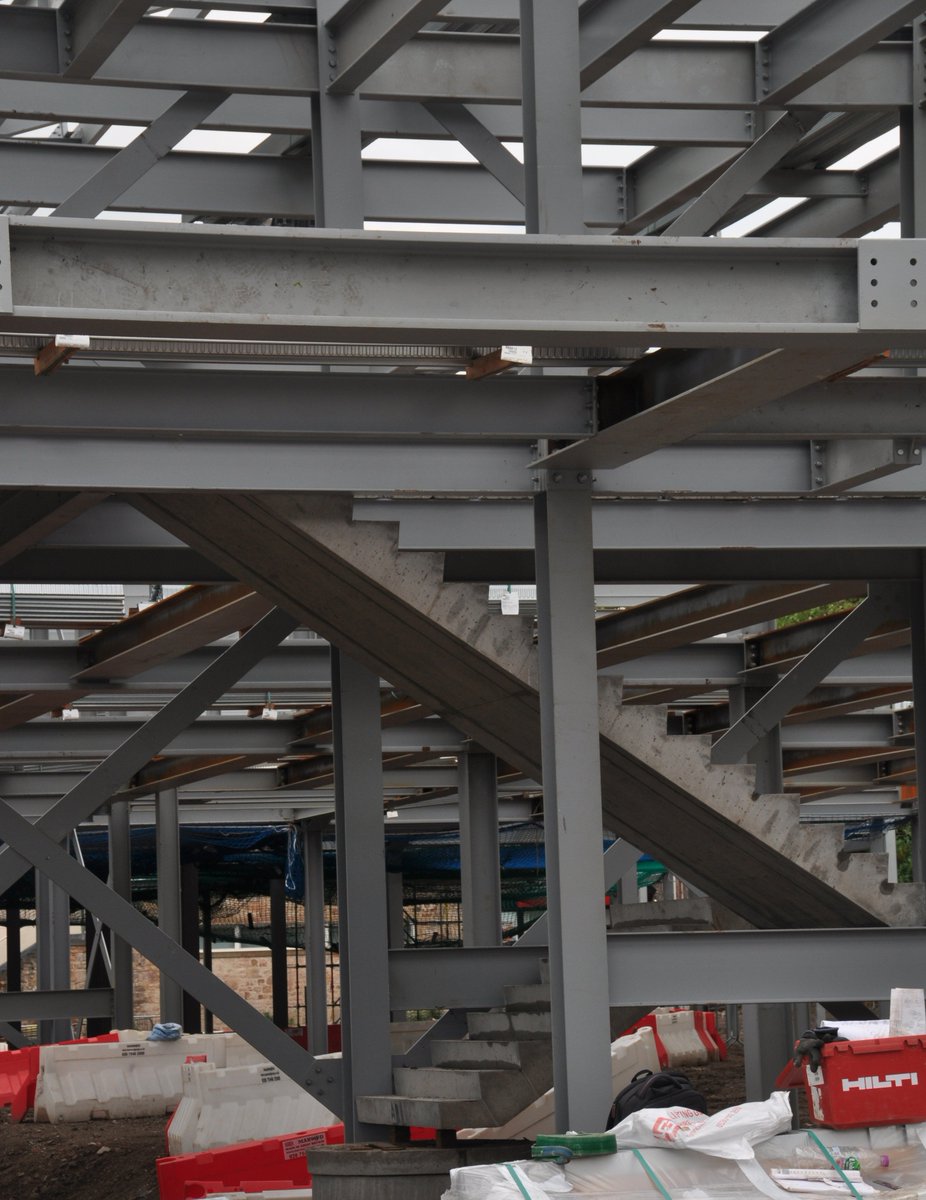 This week has seen the steel go in for the final main stand sections,  plus some pre-cast internal stairs and the first sections of decking for  the concrete floor #fridayprogresspics