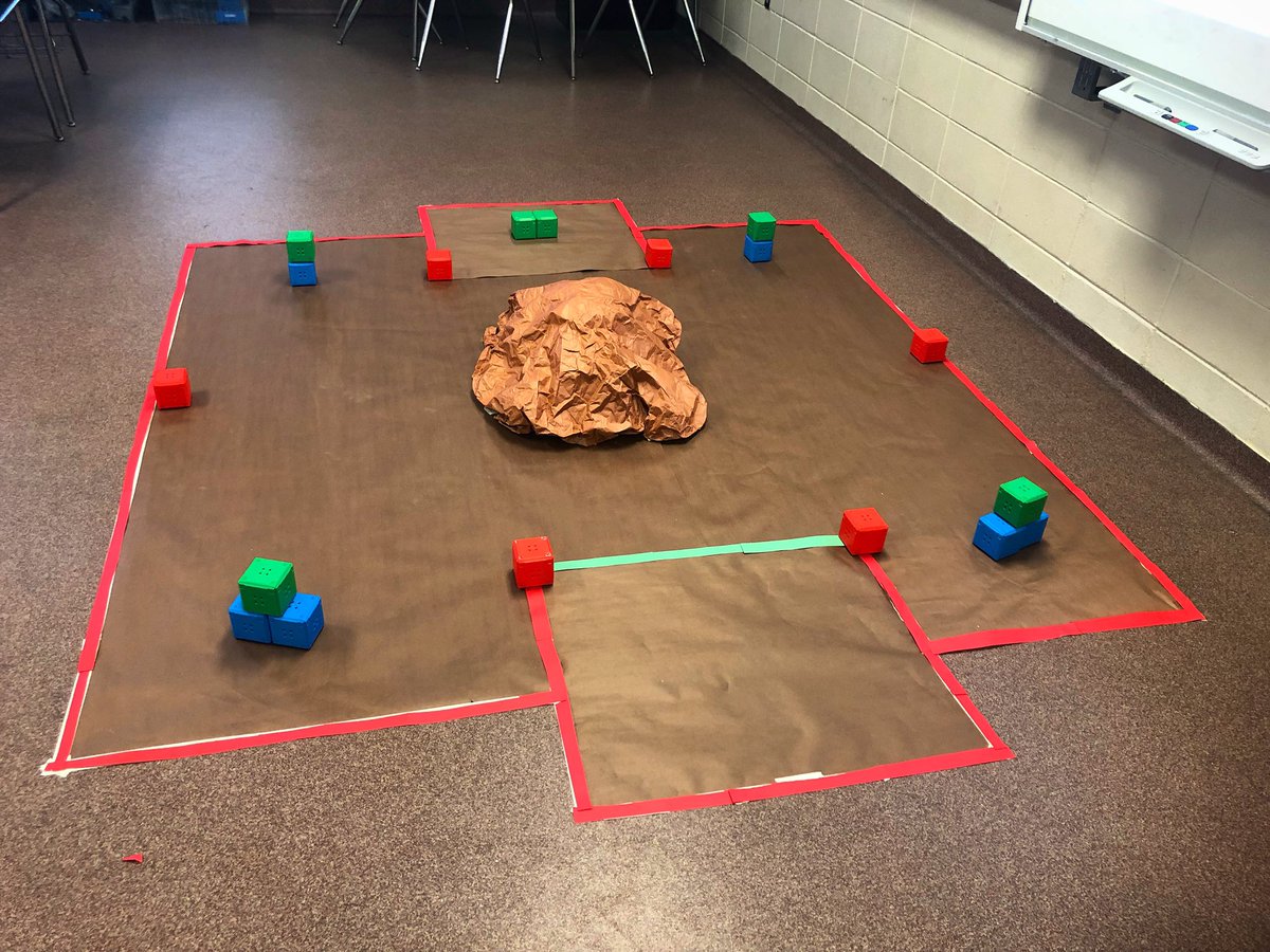 Robot maze! Students task is to get all of the green blocks past the green line without bringing any blue blocks with them or touching red. If their sensor touches red, it will cut the robot off and they will have to start all over from the beginning. #robotics  <a href="/LeeCoSchools/">Lee County Schools</a>