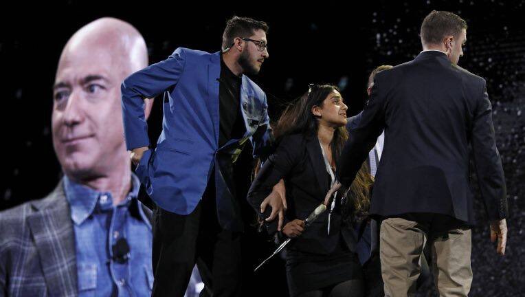 waynehhsiung's tweet photo. .@priyadxe27 getting harassed by @JeffBezos’ goons for asking the richest man on earth a question #oneclickcruelty https://t.co/oEbUsRfTGB