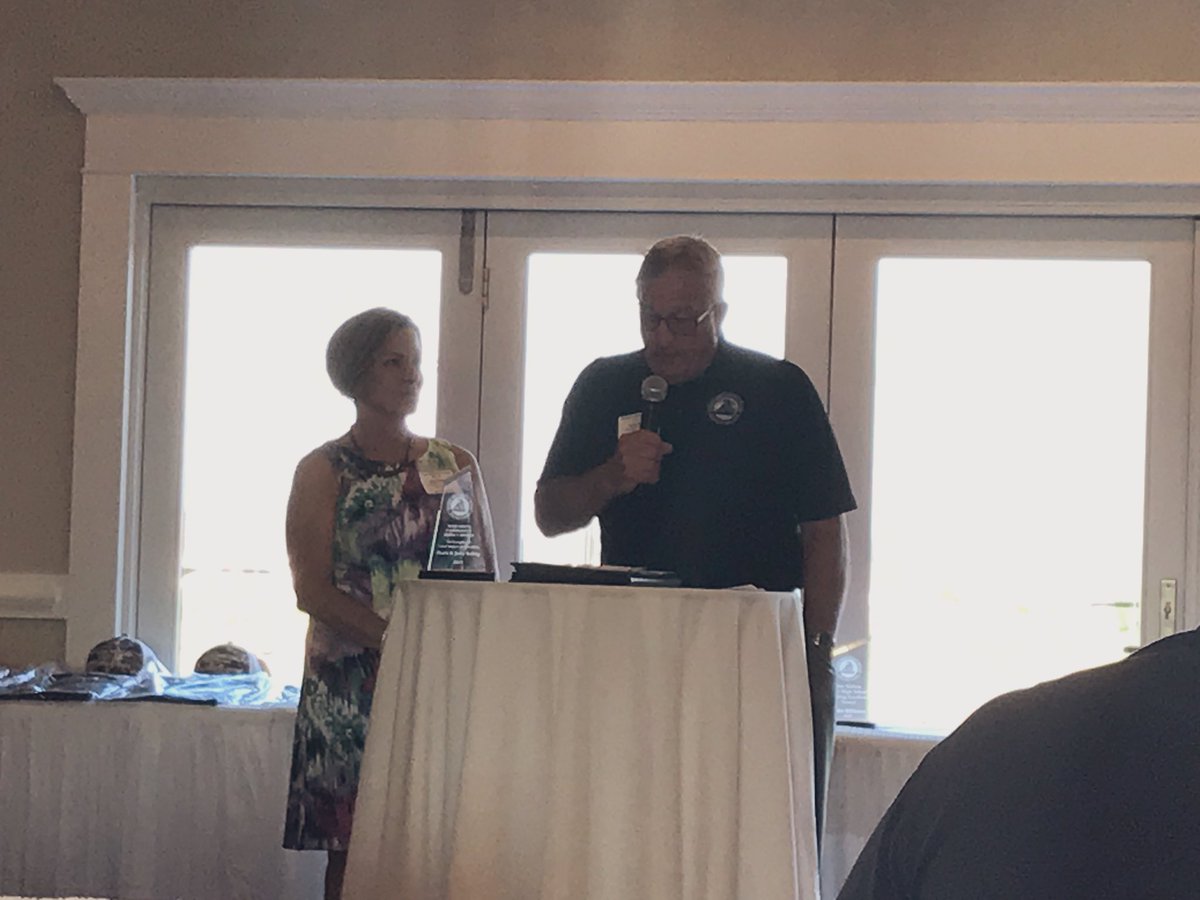 wartburgwrestle's tweet photo. Jerry and Marti Roling receiving the Russ Smith Community Impact Award at the Glen Brand Wrestling Hall of Fame banquet. Wartburg Wrestling is forever grateful for their love, passion, and continued support. Congratulations!! https://t.co/8Mkh0uP1QU