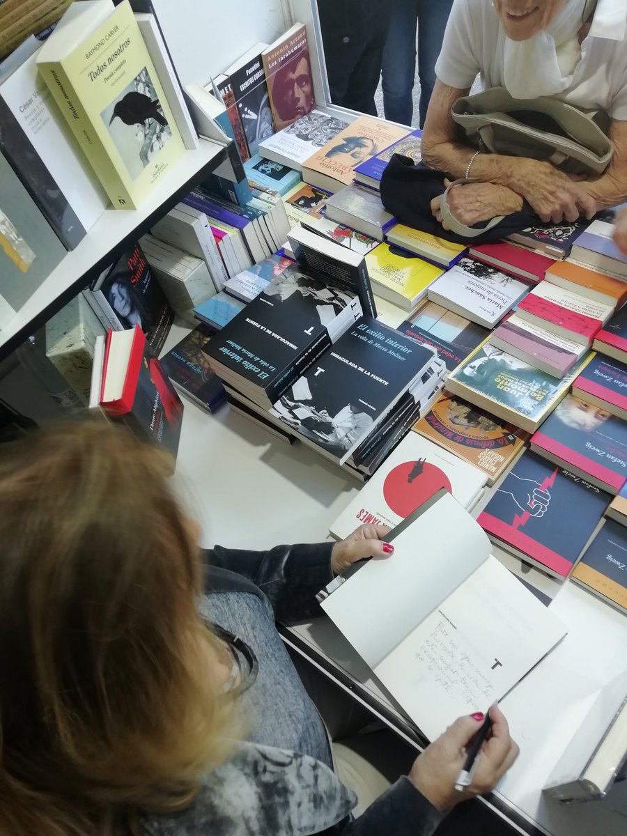 Inmadelafuente's tweet photo. Estupenda tarde en la caseta de Enclave firmando "El exilio interior. La vida de María Moliner" en la FLM19. El resto de la Feria seguirá habiendo ejemplares en la caseta  179 de @EditorialTurner https://t.co/49zRoF7HrC