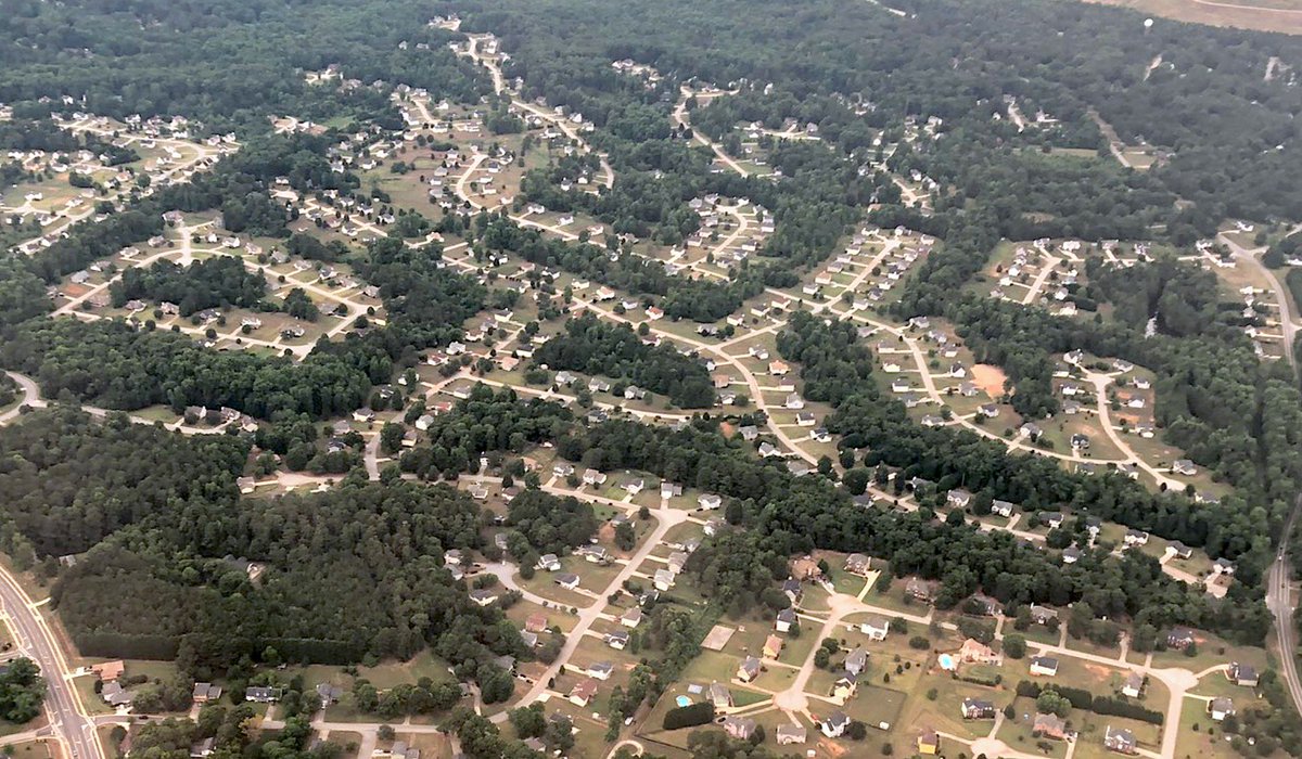 Suburban sprawl in Atlanta, pic by <a href="/brimetimenole/">Jonathan</a>.

We're still building these car-dependent places, which will devalue into housing for low-income people &amp; those aging-in-place, who'll be trapped w/out transit, w/out nearby amenities. This should be a forest.

How do we stop?