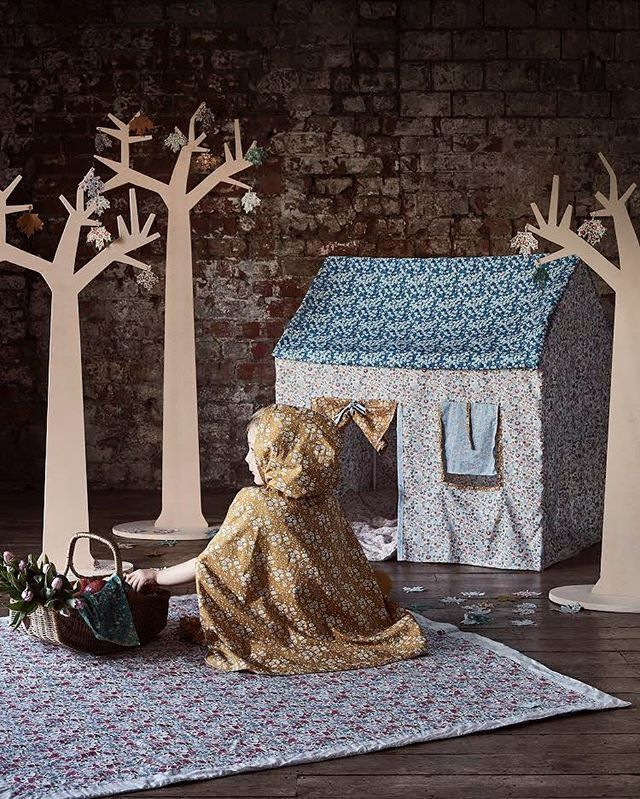 If you go down to the woods today... you’ll find a pretty dreamy collaboration 💫💕.
.
<a href="/cocoandwolf/">Coco & Wolf</a> x <a href="/fable/">Fable</a>.heart ⭐️.
.
Our classic drop hem, hooded cape, in beautiful Liberty capel mustard. Launching July #madebymagic bit.ly/2Ws5NEC