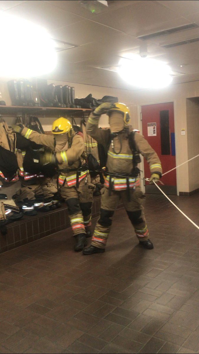 Tyne_Wear_FRS's tweet photo. Rain never stops play when it comes to training. Our #Wallsend station have been practicing breathing apparatus search and rescue techniques for searching open spaces. They are blindfolded to simulate the same conditions as a smoke filled room #BAShuffle https://t.co/jNrsGZHHQ1