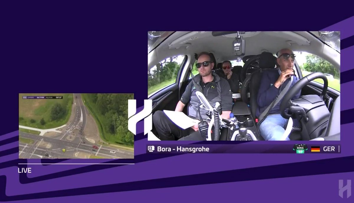 RBH_ProCycling's tweet photo. 🇳🇱 #HammerLimburg
🎙️ "Full gas at the front!"
Sports Director @ZemkeJens talks to @maciejbodnar and #Schilli over the radio from the #BORAhansgrohe team car.
Looks like the guys are really heeding his instructions as they speed towards the line for the third time. https://t.co/fVR5HIPBqc