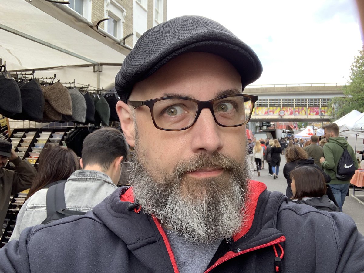 critshappen's tweet photo. I officially own a “Streed” hat. I know they have some official “flat cap” name, but they will always be “Streed’s” to me. @BoardgameCorner https://t.co/DplYCYa8Kd
