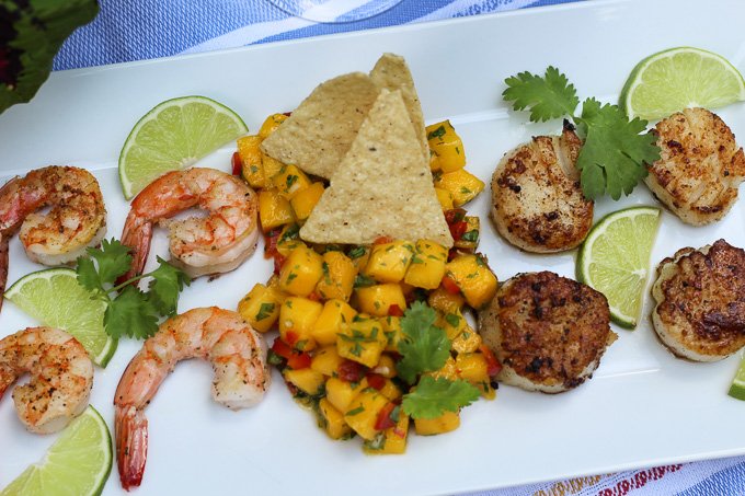 always_ravenous's tweet photo. I paired the @KWVwines Chenin Blanc with Shrimp, scallops, &amp; mango salsa. Perfect summer pairing. The wine is very food friendly with nice acidity and a light body for summer fare. #winepw https://t.co/ED81eRIBaF