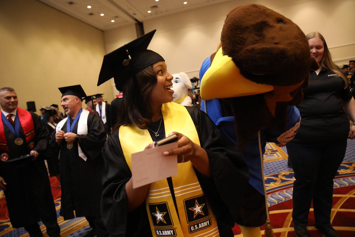AmericanMilU's tweet photo. Happy #NationalBestFriendsDay from #AMUValor! He had a blast making new friends during Commencement 2019 last month. #AMU4Life #APUSGrad #classof2019 https://t.co/LDh5iI9uVR