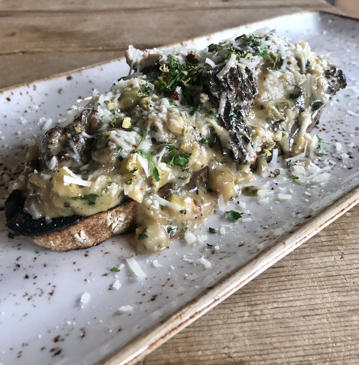 Start your Dinner off tonight with our Morels & Toast Appetizer. Hand foraged Oregon morel mushrooms are sautéd and served over charred house made  sourdough and topped with Pecorino. #94thStreet #LiquidAssets #OCMD #Morels #FancyToast
