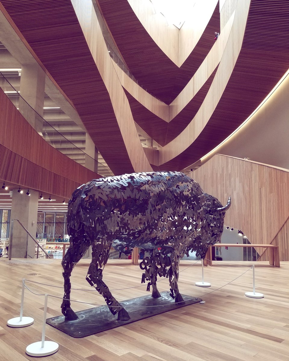 Buffalo sculpture by Lionel Peyachew, made up of metal letters that spell various words in Indigenous languages.
#calgary, #alberta, #canada, #thebow, #spring, #lionelpeyachew, #calgarydowntown, #calgarycentrallibrary