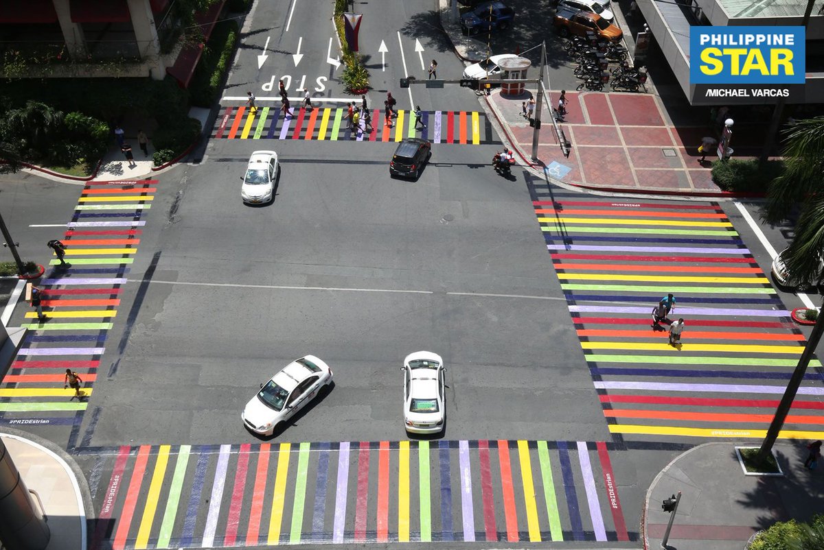 PhilippineStar's tweet photo. Pedestrian lanes at Araneta Center Cubao in Quezon City were painted with rainbow colors in celebration of the LGBTQIA+ communityβs Pride Month. https://t.co/NJotyPNl24