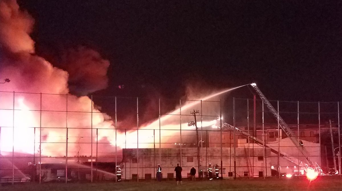 PhillyFireDept's tweet photo. About 140 PFD members and 60 apparatus responded to this fire last night at a garage on Adams Avenue in Frankford. First-in companies reported heavy fire through the roof around 9:15pm. The 4th alarm was struck about an hour later. The fire was placed under control at 11:38pm. https://t.co/jdy4NOWoAg