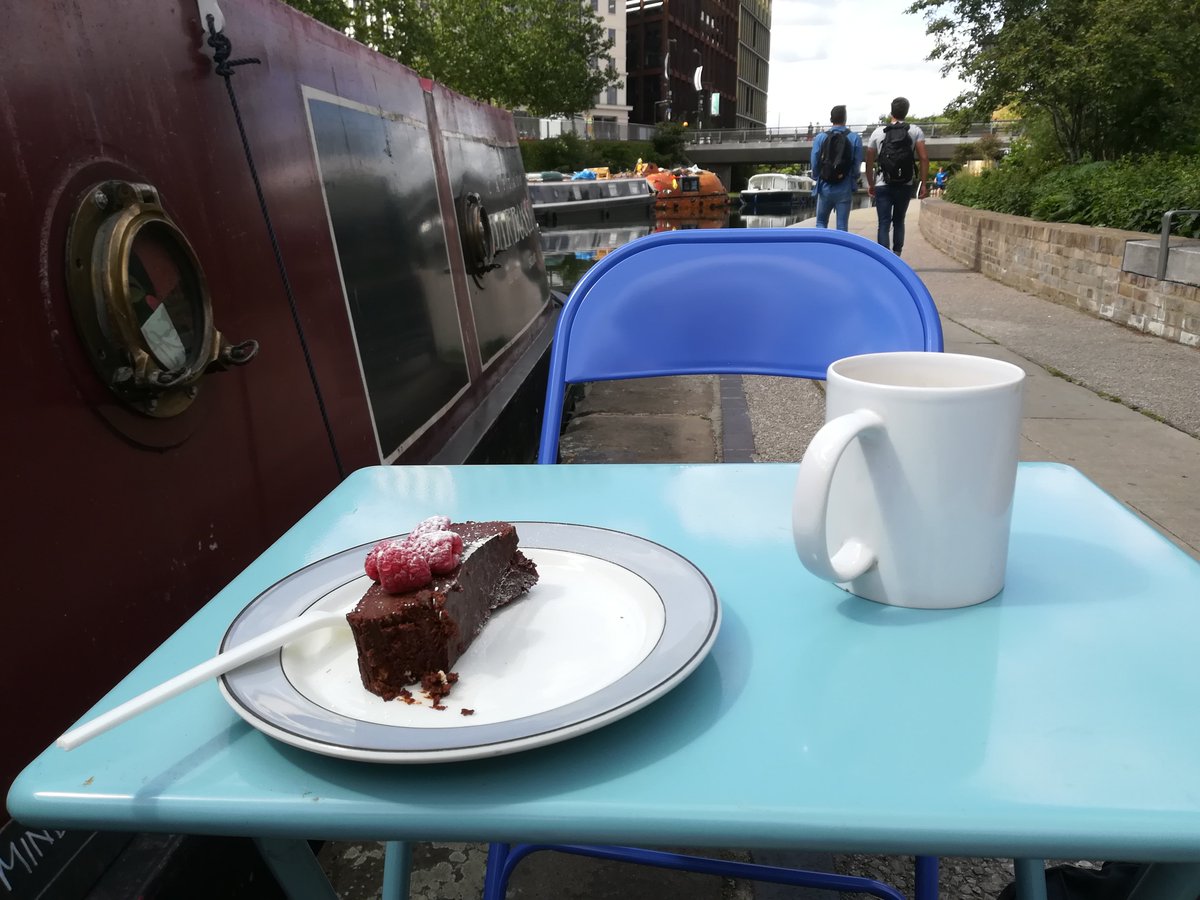 libchris's tweet image. My idea of heaven chocolate torte with raspberries, and a cuppa... Sitting by a canal boat near King&apos;s Cross :-)