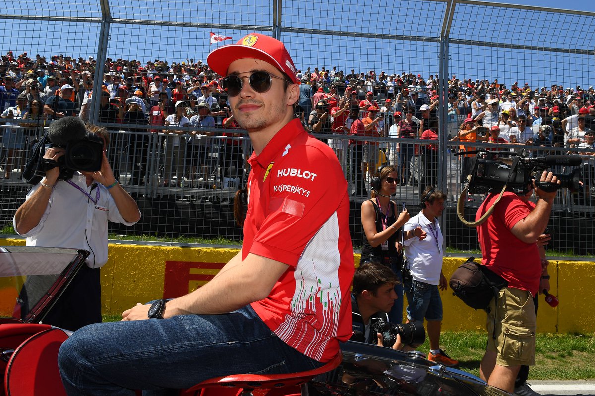 ScuderiaFerrari's tweet photo. Time to say hello and bonjour to our Canadian #Tifosi! 
Give us a wave 👋
#Seb5 #Charles16 #essereFerrari 🔴 #CanadianGP https://t.co/3t5SG9LjED