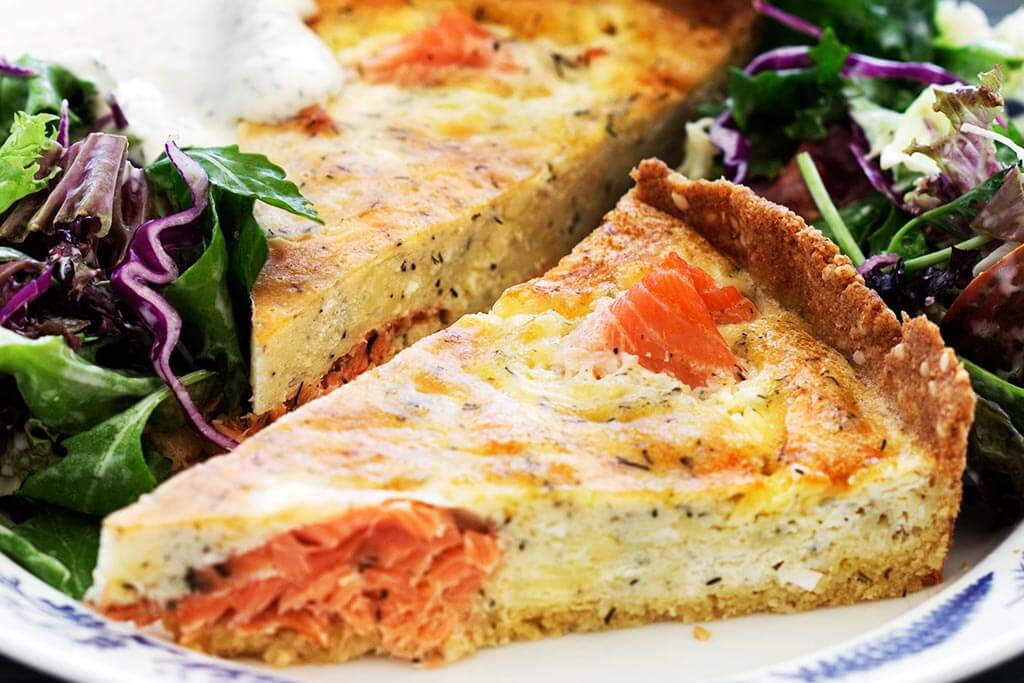Salmon and dill venerate each other so much it's practically ludicrous. What's more, you'll swoon over them together, as well, in this generous and gooey keto pie. #ketorecipes #ketosalmon #ketopie #recipes #ketogenicdiet #keto #ketofriendlylife #diet bit.ly/2ZlMY37