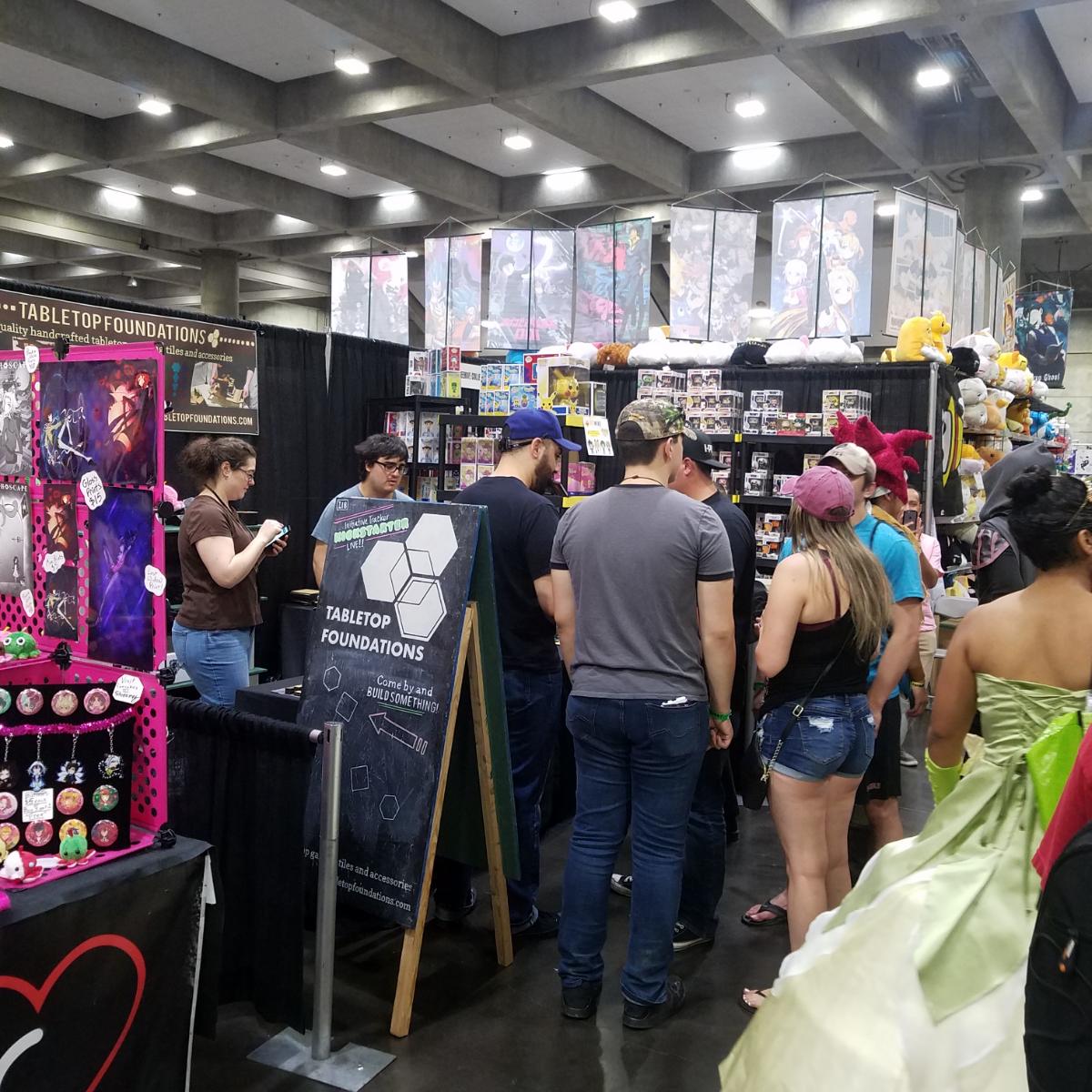 Our serious thinking faces on this busy <a href="/SacAnime/">SacAnime</a> Sunday! 

(I think it's the first picture of both of us! Chris and Nichole: Tabletop Foundations!)

#ttrpg #SacAnime #convention #SundayMotivation #dnd5e