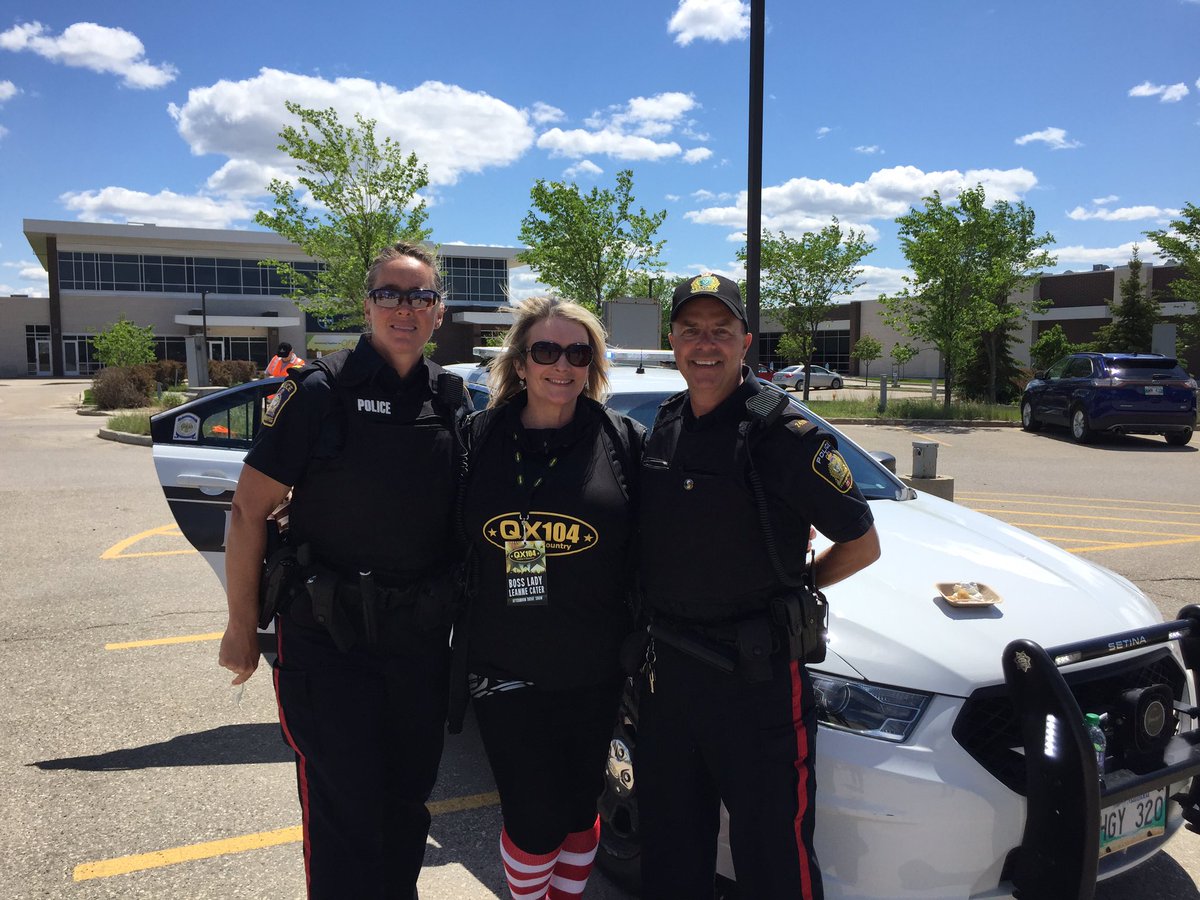 QX104winnipeg's tweet photo. We’re having a great time with @wpgpolice today at the @RMHManitoba #RedShoeCrewWalk, but the Boss Lady ran into a bit of trouble... go check it out on our Instagram! #qxstreetsquad https://t.co/SpGenL0GSM