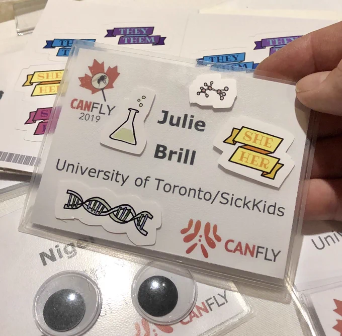 A name tag with stickers