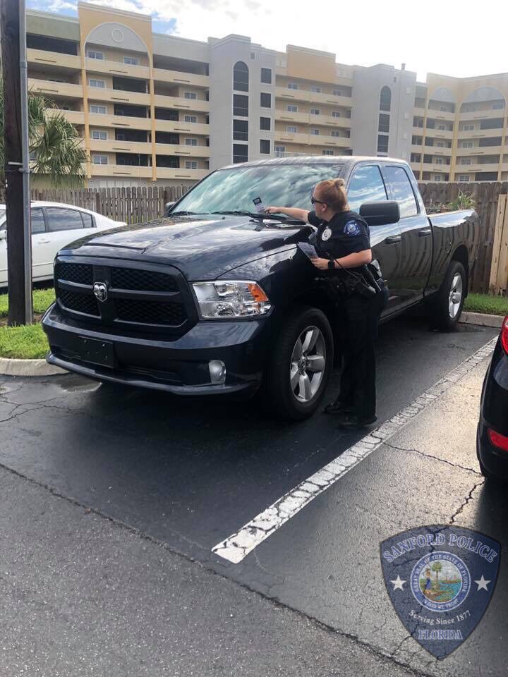 SanfordPolice's tweet photo. Officer Bradshaw and Hooper were hard at work in the heat of the afternoon. They helped spread the word on vehicle security by conducting Vehicle Safety Surveys at Park at Ravello Ave. Then it was on to #OperationCopsicle at Park on Park to cool down. #OfcHooperMayNeedAStepStool https://t.co/DSpaiTO02e
