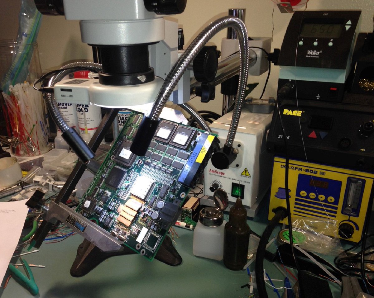_BehindTheCode's tweet photo. Repairing a board MOD on these Ultra64 Dev boards I've been debugging. The onboard Firmware supports 4MBytes of RAM, however these boards were modified up to 8MBytes, Technically never tested. My HAKKO HotAir Rework Station was up to the task + IDC headers! #N64DEV #64Drive #N64 https://t.co/bF41R3kYs8