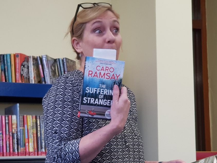 CaroRamsayBooks's tweet photo. Do I look surprised at how well the first public reading of The Suffering Of Strangers went? I have to say, the audience was hooked....'Don't stop there. what happened to the baby?' So I told them, just in case they were worried! @blackthornbks #salibraries #supportlibaries https://t.co/lMFDmDyMQi